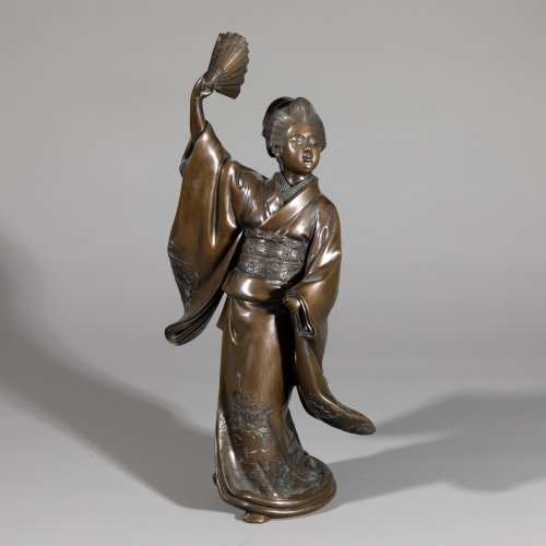 Figure of a dancer with a fan