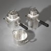 Two jugs with sugar bowl