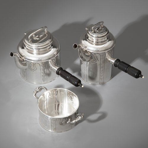 Two jugs with sugar bowl