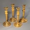 Set of four Empire candlesticks