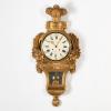 Cartel wall clock in classicist style