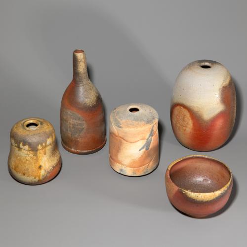 Four vases, a small bowl