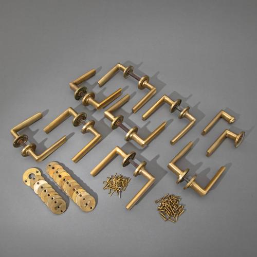 9 Türdrücker Sets, 1930er-50er Jahre